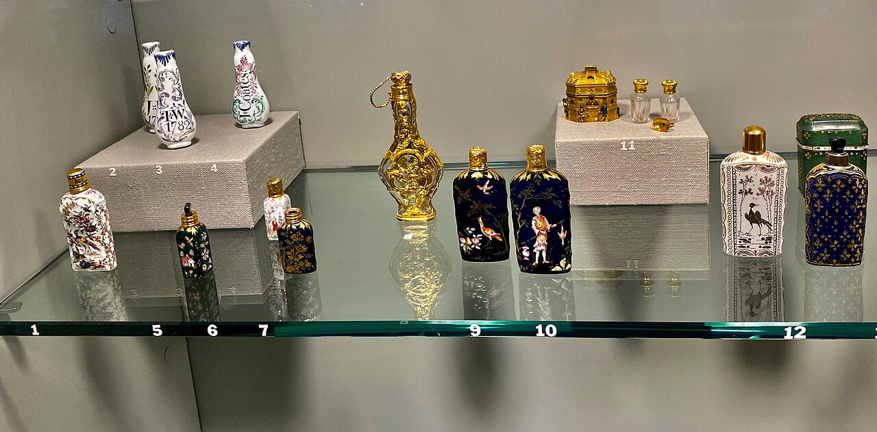 Historic glass perfume bottles - editorial cover for unisex perfume article