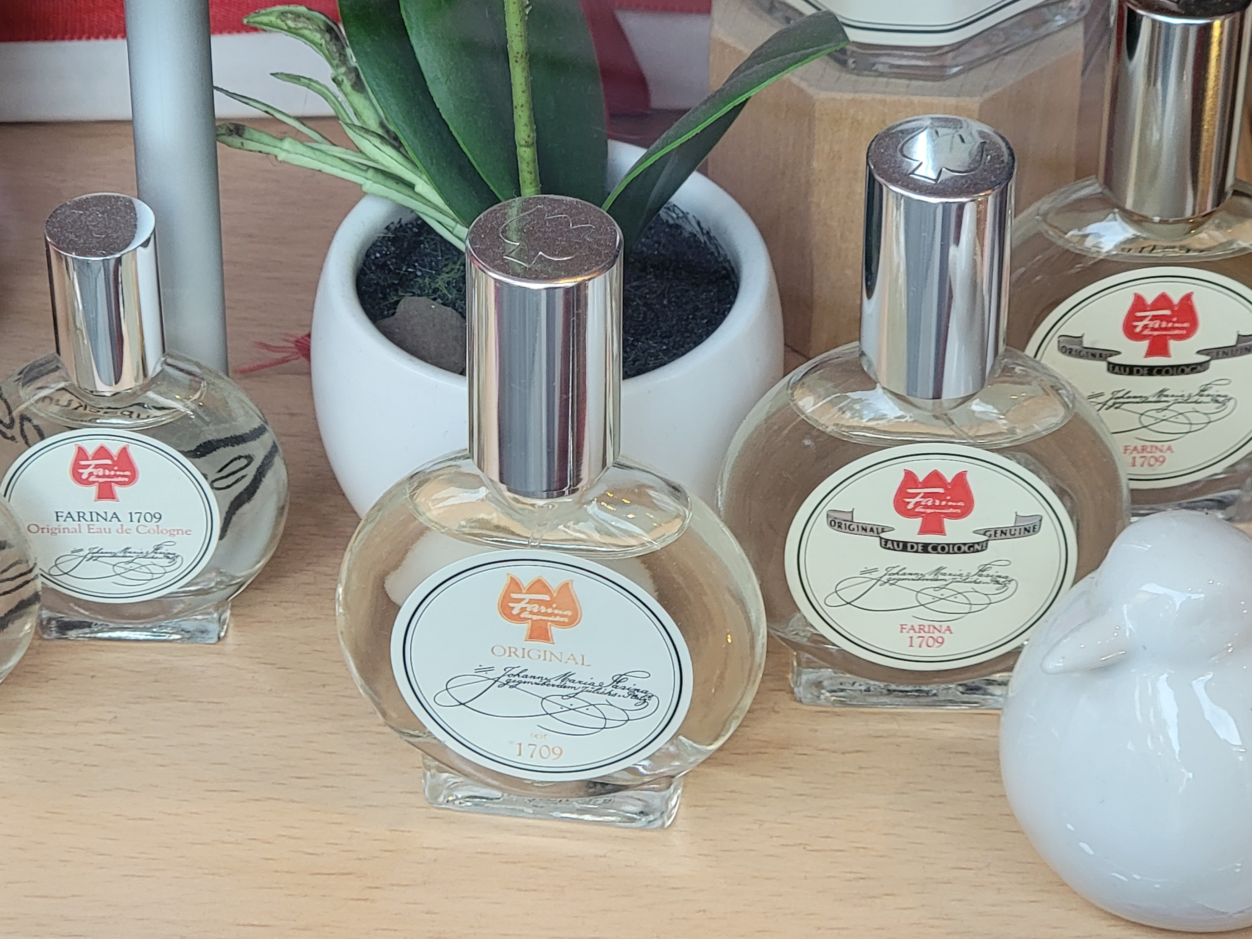 Editorial hero image of eau de cologne bottles for office perfume article